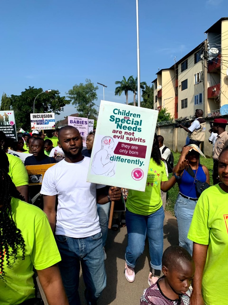 Community awareness march promoting inclusion