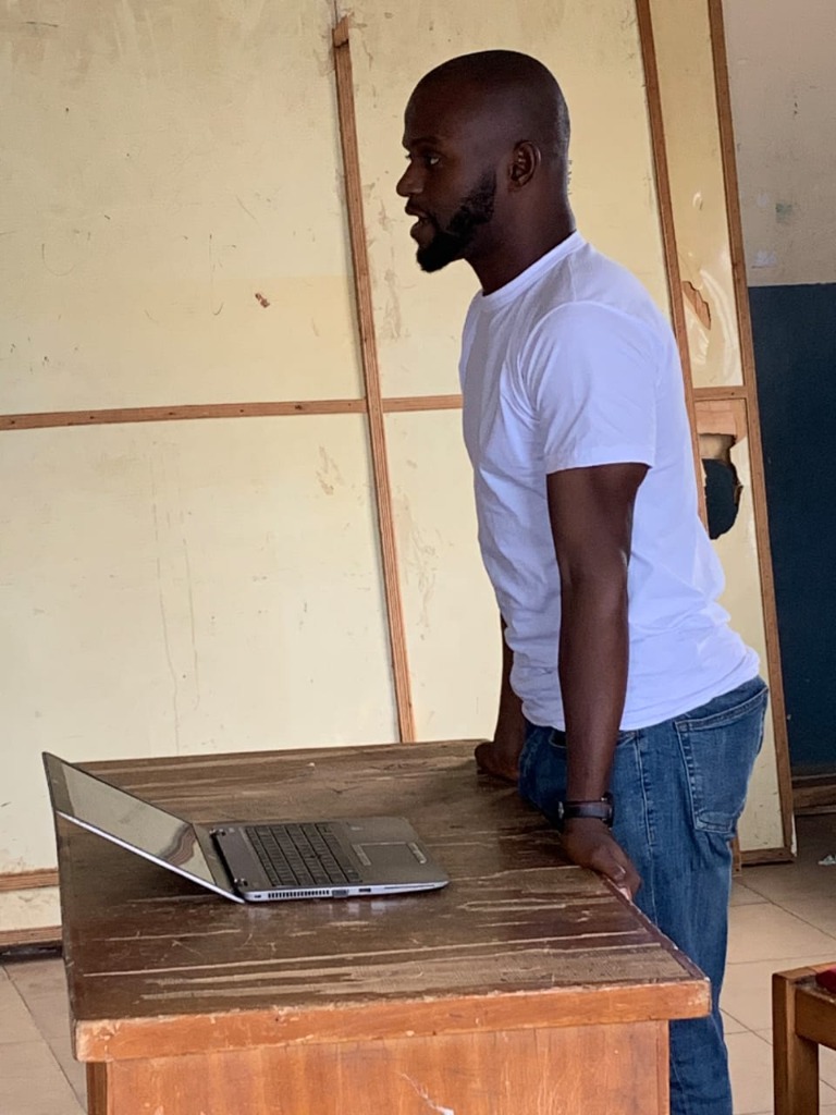 Facilitator conducting teacher training session